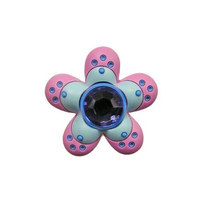 Jibbitz™ - round dot flower blue